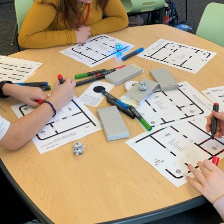 Students are coding a path for their Ozobot